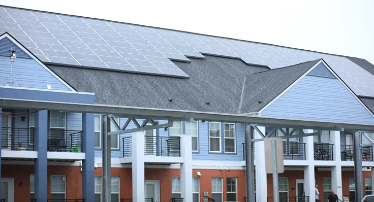Rooftop and canopy solar at multi-family housing
